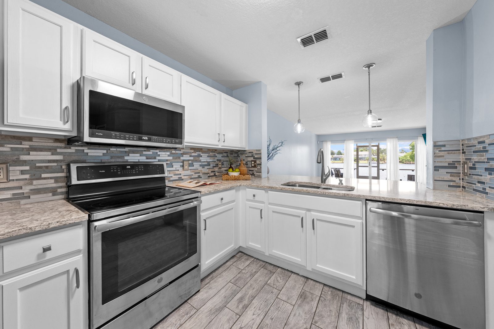 Remodeled kitchen with stainless appliances